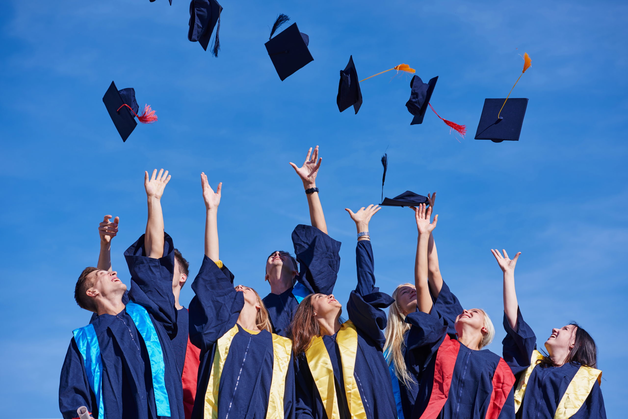 graduates-throwing-caps-in-the-air