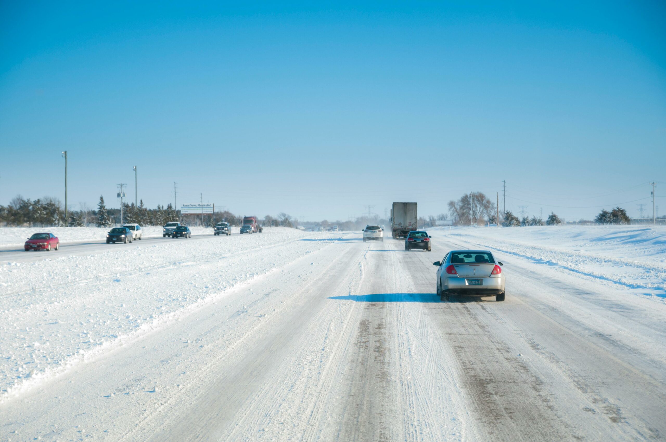 cars-and-trucks-on-snowy-highway